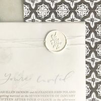 Magnolia Fixer Upper HGTV inspired wedding invites with Spanish tile watercolor and wax seal on a vellum wrap