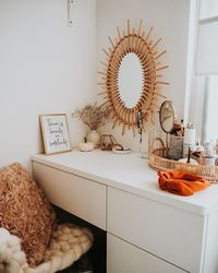 Boho chic make-up vanity decor idea. Boho circular mirror with modern Ikea make-up vanity desk. This minimalist makeup vanity decor is eclectic whilst being simple and modern.