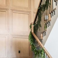 Remedy Design Firm on Instagram: "This white oak accent wall is so beautiful as is. As we styled the holiday decor in this stairway, we wanted the beauty in the details of this home to still be present, so we selected simple greenery and ribbon to deck the halls of our #maplecrossingsproject. Furniture & Accessories: @elementsbyremedy Builder: @rcdentcustomhomes Architect: @jewkeshomedesign Photography: @rebekahwestoverphotography Design: @remedydesignfirm #maplecrossingsproject #remedydesignfirm #elementsbyremedy #utahhomes #homedesign #homeinspiration #homeinspo #housedesigns #homeinteriordesign #interiordesign #interiordesigninspiration"