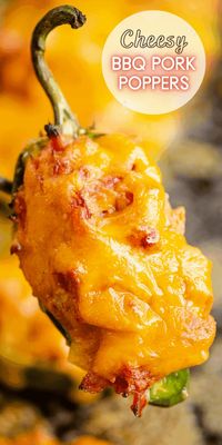 Cheesy BBQ Pork Jalapeno Poppers are a spicy and hearty appetizer great for a game day snack or an easy 30 minute dinner in the oven! #Appetizer #GameDayFood #JalapenoPoppers