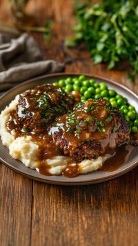 Savor the comfort of homemade Salisbury steak! Juicy patties smothered in a rich gravy await. Dive into this classic recipe and bring warmth to your dinner table! Click for the full recipe!