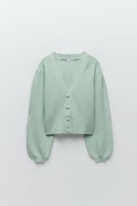 Cropped Cardigan With V-Neck And Long Balloon Sleeves. Front Self-Lined Button Closure. Ribbed Trim.