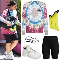 Just Don Record Low Tie Dye Sweatshirt ($350.00), ATM Anthony Thomas Melillo Micromodal Ribbed Bike Shorts ($175.00), a Balenciaga Everyday Leather Belt Bag ($1,250.00), a duffel bag from her gym Wasatch Combat Sports (Not available online) and Maison Margiela Retro Fit Destroyed Sneaker ($895.00).