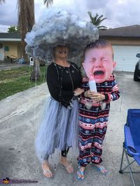 Paula: I am wearing the costume and I was thinking of being one of the 4 seasons which turned into a raincloud. I took a old hat from a costume I...