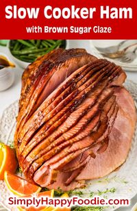 Slow Cooker Ham with Brown Sugar Glaze is the ultimate in easy, hassle-free Holiday dinner recipes. Slow cooking ham allows the flavors to meld together into a mouthwatering masterpiece, while the brown sugar glaze creates a caramelized, glistening exterior. The easiest holiday ham recipe. crockpot ham, glazed ham, dinner recipe, spiral ham, spiral cut ham, simplyhappyfoodie.com