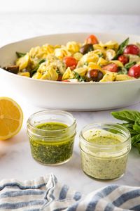 This pesto salad dressing recipe is a versatile and flavorful salad dressing that's perfect for summer picnics and barbecues! You can either make a pesto vinaigrette, or you can make it a creamier version with mayonnaise and mustard.