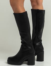 Soda Knee High Boots. Features A Faux Leather Upper. Round Toe. Platform Sole. Exterior Zipper For Easy On/off. Stacked Synthetic Heel. Approx. Shaft. 15.5" Approx. Heel Height: 3.5". Imported.