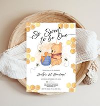 "This is an editable \"So Sweet to Bee One\" Baby Shower invitation template featuring baby Winnie the Pooh enjoying his pot of sweet honey, cute buzzing bees, and honeycombs!  Click on the link below to view our matching items. Matching Items: https://www.etsy.com/shop/SavageSensations?ref=simple-shop-header-name&listing_id=1020380910&search_query=wpb This is an editable Invitation template using Corjl.com - It is easy to use, you will receive an email after your purchase in which you may edit your card. We do not edit for you. Easily edit the template using corjl.com - an online template editor that allows you to personalize your template in your internet browser using your computer or mobile device - No need to install special software or download fonts. Try it before you buy it, look f