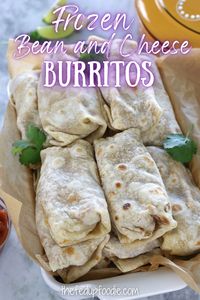 From-scratch Frozen Bean and Cheese Burritos are a delicious make-ahead meal that are extremely budget friendly. These burritos are delicious as a quick and healthy lunch or dinner perfect for busy weeks and is always a staple in our freezer. #MakeAheadBurritos #MakeAheadBurritosFrozen #FrozenBurritoRecipe #MealPrepBurritos #FreezerLunchesMakeAhead #FreezerDinnerMakeAhead #FreezerMealPrepIdeas #BeanBurritoRecipe