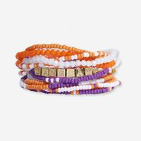 Show your team spirit with our curated Game Day bracelet stack. It features 10 strands of seed bead bracelets and a brass friendship bracelet sporting the word "GAMEDAY".