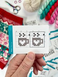 THE WINTER DOODLE DECK is your favorite new portable colorwork stitch dictionary! The Winter Doodle Deck is 51 Charts full of festive cheer! The charts are a mix of sparkling snowflakes on cozy winter nights and fun and jolly holiday gifts. Create gifts for the whole family using these playful winter colorwork motifs! The ultimate way to inspire creative colorwork! Use these flexible mix-and-match chart cards to visually re-arrange and design the perfect colorwork pattern from start to finish. 4