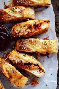 BBQ Chicken Stromboli is full of melty provolone cheese, chicken, caramelized red onions and sweet and tangy bbq sauce. This makes an amazing quick and easy meal or appetizer!