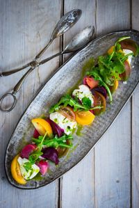 An Heirloom Tomato, Beet and Burrata Salad with flavorful Basil Oil -- a simple and delicious recipe, the perfect salad for summer! | www.feastingathome.com