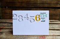 Numbers (add acetate to back of card front to provide a place to adhere the centers of the 6 and 2)