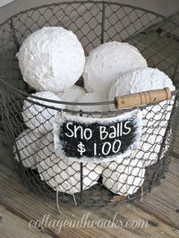 Need to put this on the porch with my decor for the holidays! faux snow balls - Winter decorating ideas