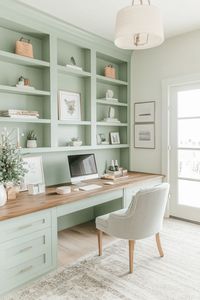 sea mist green built ins inside home office with chair