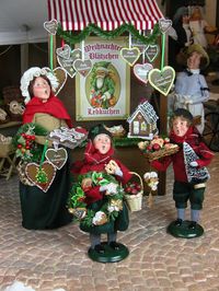 Christmas Market — Woman & Children Selling Gingerbread