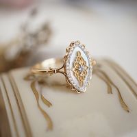 Handmade productsMaterial: gold-plated S925 sterling silverStone color: whiteStrap color: goldStyle: Art Deco Natural ShellfishMain Stone Size: 5x7mm, cubic zirconia