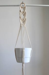 Macrame plant hanger with decorative braid in different variations (see SIZE GUIDE below) Great decoration for boho or scandi home. Perfect gift for any plant lover ;) MADE TO ORDER in 1-3 business days >> color: natural cotton/ecru/beige/linen >> measurements: (this listing is for the