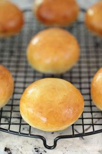 These delicious, golden glazed Buttermilk Brioche Buns have a soft, tender crumb, and come together, start to finish, in less than an hour!
