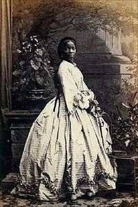 Lady Sarah Forbes Bonetta Davies, photographed by Camille Silvy, 1862 Sarah Forbes Bonetta Davies was a child born into a royal West African dynasty. She was orphaned in 1848, when her parents were killed in a slave-hunting war. She was around five years old. In 1850, Sarah was taken to England and presented to Queen Victoria as a “gift” from the King of Dahomey. She became the queen’s goddaughter and a celebrity known for her extraordinary intelligence.