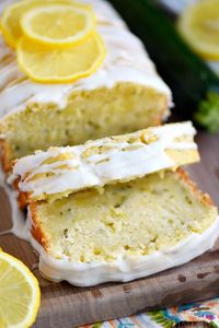 This Lemon Zucchini Cake is definitive proof that lemon and zucchini belong together! Beautifully moist and undeniably delicious, this easy cake is topped with a lemon glaze that will keep you coming back for one more slice.  An excellent way to use up that zucchini from your garden! // Mom On Timeout #zucchini #recipe #lemon #cake #baking #dessert #desserts #momontimeout