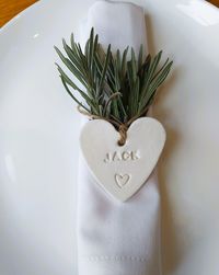 Elevate your wedding tablescaping with my elegant and unique personalised napkin rings that double as charming favours and keepsakes. Handcrafted with care, these unique clay hearts add a personal touch to your celebration, making each guest feel special. The timeless design and personalised details make them a keepsake that captures the essence of your memorable day. Give your guests a meaningful token that not only complements your table setting but also becomes a lasting memento of your joyou