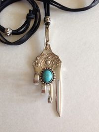 Antique dessert fork pendant. Embellished with turquoise cabachon