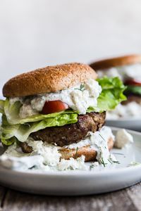 This easy Mediterranean turkey burger recipe, loaded with feta, onions and herbs and slathered in cooling homemade tzatziki, is one you’ll reach for time and time again.