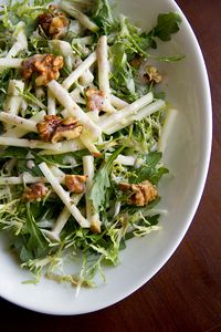 Honeycrisp apple salad is a sweet, seasonal take on green salad, filled with fresh apples and candied walnuts all tossed with a spiced cider vinaigrette! | thecozyapron.com #applesalad #honeycrispapplesalad #honeycrispapples #applesaladrecipe #applesaladrecipehealthy #applesaladhealthy