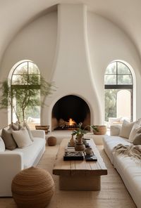 Looking for the perfect fireplace design for your room's focal point? We're sharing the 12+ most stunning fireplace ideas, plaster fireplaces and modern fireplace surrounds, as well as fireplace ideas for your living room, bedroom and more! Plus, grab our FREE DESIGN LIST while you're on our website! #fireplaceideaslivingroommodern #bedroomfireplaceideas #interiordesigninspiration #fireplacesurroundideas #modernfarmhouse #plasterfireplace #cozymodernstyle #livingroominspiration #cozylivingrooms