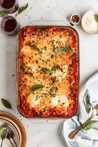 This Vegetarian Baked Spaghetti is made extra cheesy with both mozzarella and ricotta cheese. There's no boiling of the noodles required, making it a super easy, one-pan dinner recipe the whole family will love!