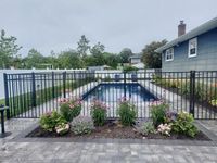 54" pool code aluminum fence and self-closing gate installed in East Islip, NY, by Liberty Fence & Railing.