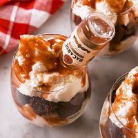 Rum & Coke lovers, this is your DREAM dessert. Get the recipe at Delish.com. #recipe #easy #easyrecipes #delish #rum #coke #soda #dessert #dessertrecipes #cake #chocolate #bacardi #whippedcream