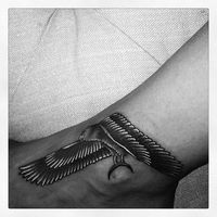 Rihanna’s Egyptian falcon tattoo by Bang Bang