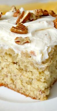 Banana Cake with Cream Cheese Frosting-- A moist, deliciously tender and fluffy Banana Cake slathered with just the right amount of Cream Cheese Frosting!