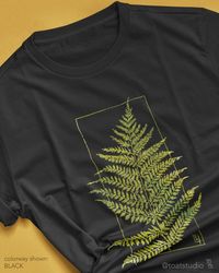 "This plant leaf t-shirt is great for plant, flower, and garden lovers. Great gift for anyone who spends their time enjoying nurseries, plant shopping, and botanical gardens. FABRIC CONTENT:  - Fabric content varies based on color. Solid colors are 100% cotton, heather colors are 52% cotton/48% polyester, Athletic Heather and Black Heather are 90% cotton/10% polyester) - Light fabric (4.2 oz/yd² (142 g/m   FIT & CONSTRUCTION :  - Runs true to size (sizing runs slightly larger for women, as this is a unisex style) - Side seams help hold the garment's shape longer and give structural support - Highly elastic ribbed knit collar and neck seam helps retain neck shape  - Reinforced shoulder and neck seams stabilize the back of garment and prevents stretching   SIZING : Please see sizing image as