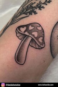 A mushroom tattoo doesn’t have to be a basic mushroom that you put on your body. It can also have personality! If you’re a romantic soul, then you may want to consider putting little hearts instead of the freckles on the mushroom.