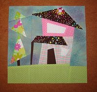 Okay, time to start showing some of the July blocks from my quilting bees.  Here's a wonky house for Muriel in the Sew Buzzy bee group.  Sh...