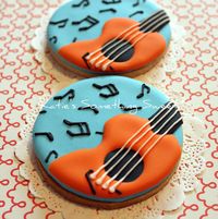 country music themed birthday party | year-old boy's music themed birthday party favors, Guitar Cookies.