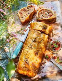 A great recipe for a picnic; simply place this giant sausage roll on a board and let everyone help themselves