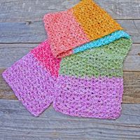 This colorful scarf is made using the half double crochet v stitch, which is an easy repeat. The colorful scarf uses Lion Brand’s Mandala Ombre, a colorful gauge 4 yarn. This pattern has child and adult sizes. There is a free printable PDF available.