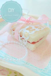 This DIY Lace Wrapped Tea sandwich is a simple and delicious item that pairs perfectly with a nice cup of tea, or even an infused cocktail! This versatile sandwich is perfect for guests to grab and go, allowing them to socialize and snack. The best part, the prep time is only 2 minutes! See more tea party ideas by @sweetlychicdes on the OTC blog.