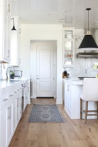 Classic Modern Kitchen Design via Becki Owens Design Featuring Butte Dome Pendants + Reed Swing-Arm Pendants from Rejuvenation