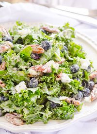 Kale, Blueberry, Goat Cheese and Candied Pecans Salad -- Clean Eating salad with homemade poppy seed dressing.