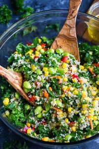 This Healthy Quinoa Salad is packed with colorful vegetables and tossed in an easy peasy whisk-and-pour Mediterranean dressing. I cannot WAIT for y'all to try this superfood salad!