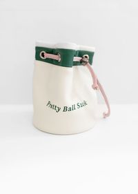 THE SOLD OUT PRETTY BALL SACK IS BACK The golf ball sack turned pretty that everyone can't stop talking about! It's sold out 3 times!! Don't let your balls roll around aimlessly in your golf bag - keep them snug and stylish in the Pretty Ball Sack! Not only does it add a touch of fun and flair to your gear, but it also makes finding your golf balls a breeze. Upgrade your golf bag game with the Pretty Ball Sack!