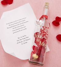 EXCLUSIVE A gift to celebrate the special bond you share. Our keepsake glass bottle is filled with red & gold rose petals for all- out romance. A scroll is included, letting you choose a message that best speaks to your relationship…and add a personalized sentiment of your own. | EXCLUSIVE A gift to celebrate the special bond you share. Our keepsake glass bottle is filled with red & gold rose petals for all- out romance. A scroll is included, letting you choose a message that best speaks to your