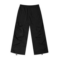 JHYQ parachute pants, pleats throughout, elasticized waistband, zip closure, four-pocket styling, cargo pocket at outseams, bungee-style drawstrings at cuffs. Composition - Cotton Blend Sizing: US/EU Regular Fit Model: 183cm/60kg 6'0/132lbs wearing size XL