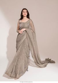 Bollywood Replica SareeBollywood model swarovski grey georgette sareeSaree in soft georgette with swarovski work all over and the blouse in georgette swarovski work 1 mtrs as unstitch material Buy this Saree at Kollybollyethnics and make your occasion very special !!. With Express Free Shipping and Custom Stitching, Shop Bollywood model swarovski grey georgette saree at kollybollyethnics from India with free worldwide shipping.